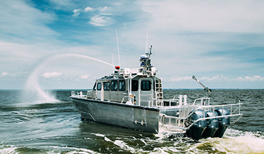 Silver Ships fire boat spraying water