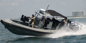 Silver Ships Ambar series AM 1100 military boat with soldiers aboard