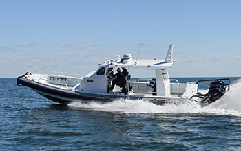 Silver Ships Ambar Series boat driving fast on the water