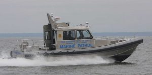 Silver Ships law enforcement marine patrol boat on ocean