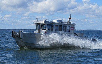 Silver Ships survey vessel splashing on ocean