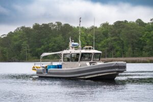 Silver Ships NSW ship on water.