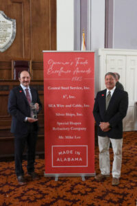 Silver Ships receiving governers trade excellence award.