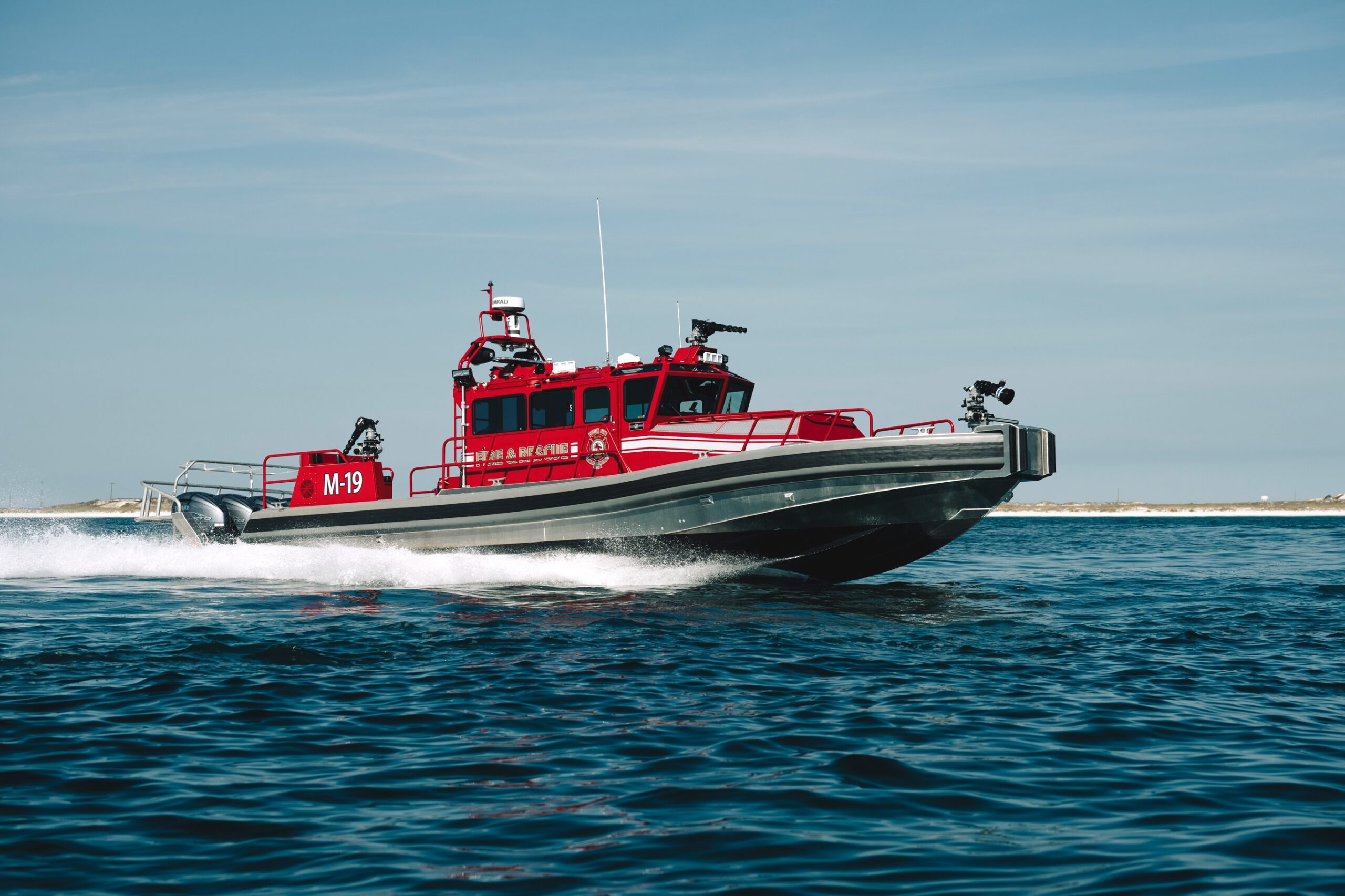 Aluminum workboat fire boat patrolling the waters