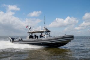 Silver Ships Special Purpose Craft Law Enforcement Gen.2 U.S. Coast Guard vessel on water.