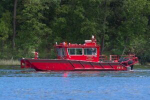 Explorer-32 Detroit Fire Department red vessel on water.