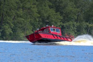Explorer-32 Detroit Fire Department red vessel on water.